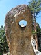 Díra ve skále. | A hole in a rock.
