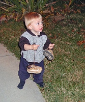 Tommy carrying his shoes