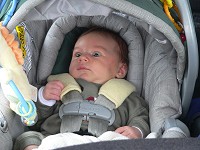 Lisa seems to be growing out of her car seat (at 7 weeks!)