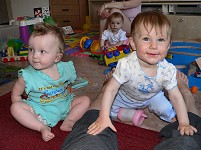 In the company of her peers, Liza holds on tight to her mother