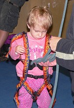 Lisa checking the quality of her rope knot