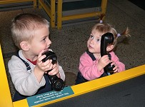 Both kids love to telephone