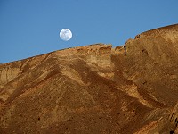 A moon over desert