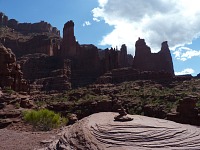 Fisher Towers loom in direct sunlight.