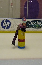 Lisa horsing around with buckets.