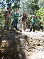 The kids had to climb up the first boulder.