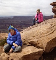 Kids posing on a rock above Colorado River.