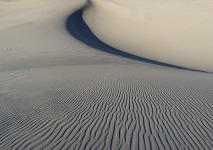 Wind patterns in the sand.