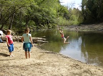 Kids asked to mostly frolic by the river.