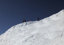 Experts had to ski down a cornice...