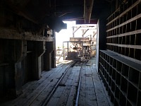 Here in the bowels of the "gallas", carts used to roll under the ore chutes.