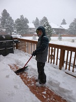 The kids can make themselves useful while playing with snow.