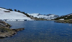 A view across a nameless pond towards northern slopes of White Mountain.