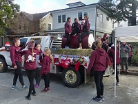 Much time goes to decorating the floats and rehearsing — but also to standing around and waiting.