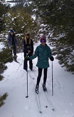 Lisa, Lucy and Tom cross-country skiing.