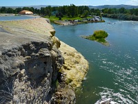 A view to Big Horn River with people's baths.