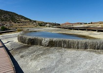 Hot springs form a cascade of pools.