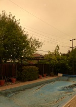 Smoky afternoon over our back yard.