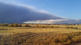 Storm moves through the prairie.