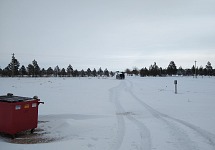 Marking the driveway — the trench to the left must be a ditch.