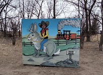 Sid riding a local mythical animal — jackalope.