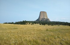 Sid visited Devil's Tower along the way on his business trip.