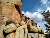 Scrambling through rocky outcrops of Sherman Mountains.