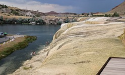 Popular primitive baths under the sinter cascade of Thermopolis hot springs.