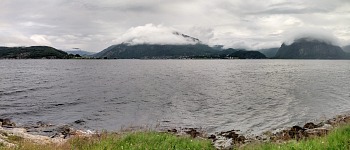 Clouds roll over hills in Lysefjord mouth. Clouds roll over hills in Lysefjord mouth.