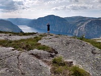 Sid takes a picture from the top of Sollifjellet — 1,850 ft over Lysefjord. Sid takes a picture from the top of Sollifjellet — 1,850 ft over Lysefjord.
