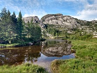 Sollifjellet reflects in Fossåna Creek. Sollifjellet reflects in Fossåna Creek.