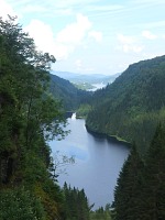 Kossdal: a narrow valley with two lakes (the other can't be seen for the woods), Mjøsvågen bay and the fjord.
